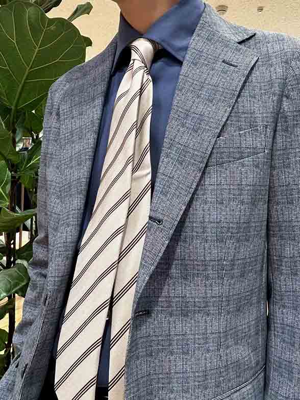 ツイーディな表現のグレンチェック